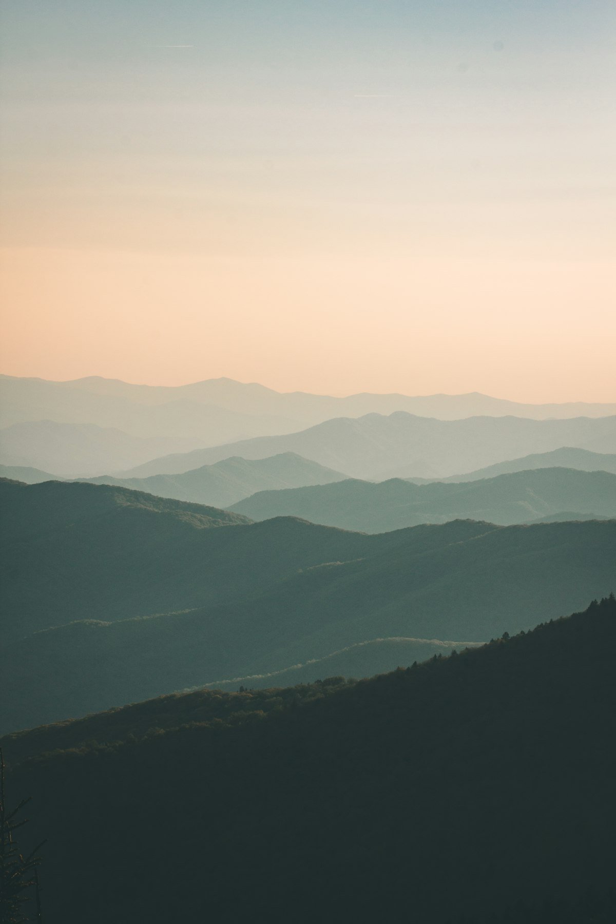 Mountain landscape bathed in warm golden hour light demonstrating directional sidelight