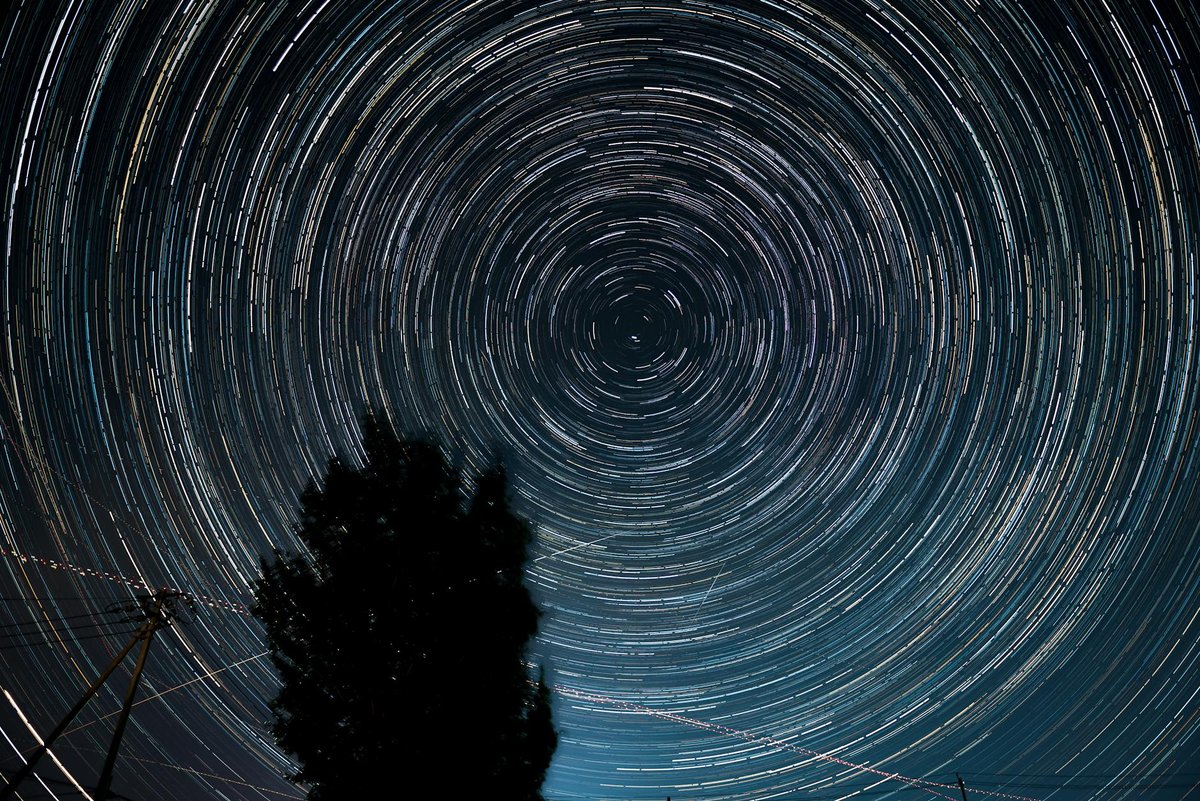 Circular star trails created by stacking multiple long exposures of the night sky