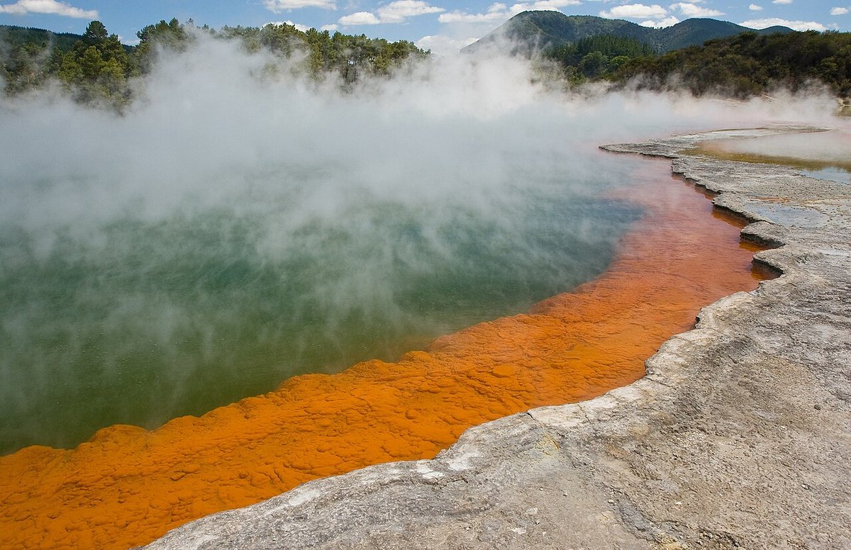 The steaming, orange-rimmed Champagne Pool at Wai-O-Tapu near Rotorua